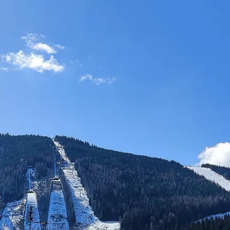 Appartamento Enjoyharrachov - Atraktivní Slunný Klimatizovaný 14 V Centru Se Saunou, Parkováním, Wifi-wlan, Sat, Herní Konzolí, Pc S Win 10, Netflix Zdarma A Možností Dobíjení Auta S Výhledem Na čertovu Horu Se Skokanskými Můstky Jen 150m Od Lanovky Harrachov